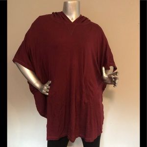 A Pea in the Pod hooded poncho with snap sides in Cranberry